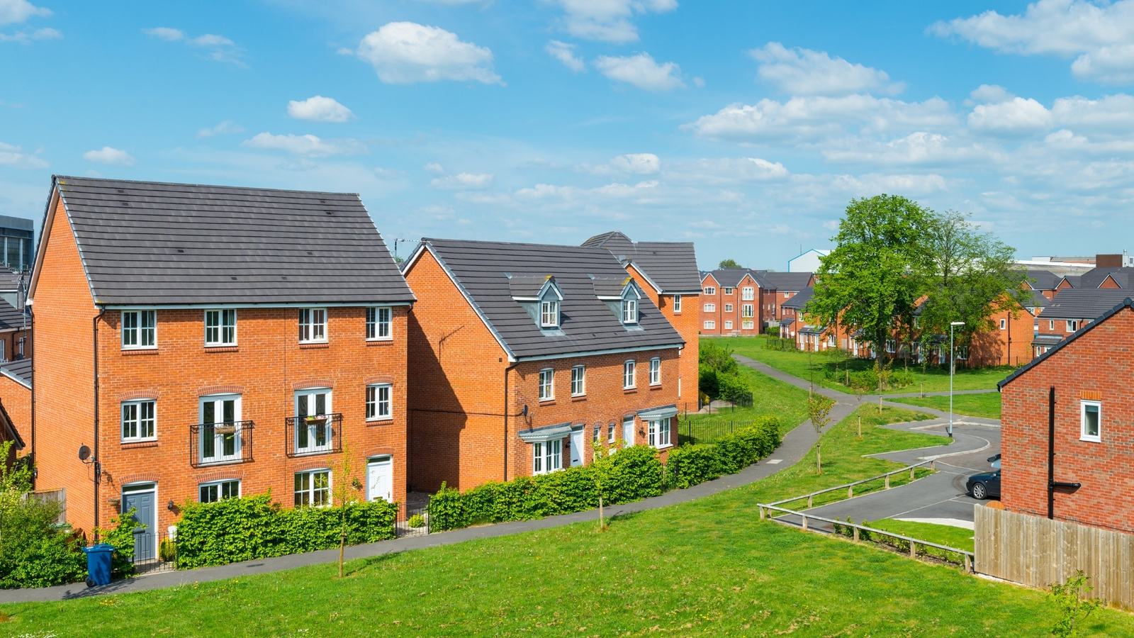 Residential street of red brick homes in England